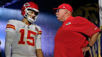 Kansas City Chiefs quarterback Patrick Mahomes (15) talks with head coach Andy Reid with tight end Travis Kelce (87) before an NFL football matchup at EverBank Stadium, Monday, Oct. 6, 2025, in Jacksonville, Fla. The Jacksonville Jaguars edged the Kansas City Chiefs 31-28. 