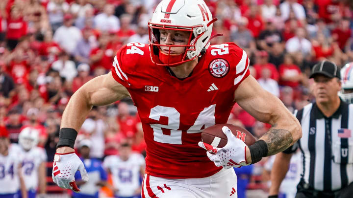 Sep 23, 2023; Lincoln, Nebraska, USA; Nebraska Cornhuskers tight end Thomas Fidone II (24) runs for a touchdown after a catch against the Louisiana Tech Bulldogs during the fourth quarter at Memorial Stadium. 