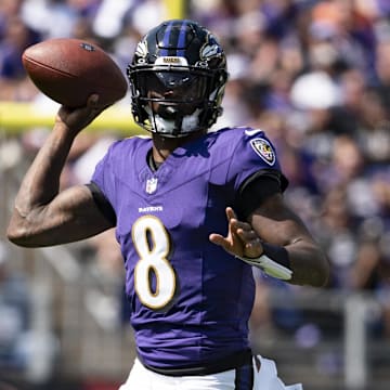 Baltimore Ravens quarterback Lamar Jackson (8) looks to throw wide receiver Zay Flowers (4) during the first half against the Las Vegas Raiders at M&T Bank Stadium. 