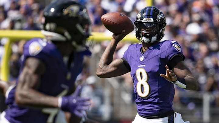 Baltimore Ravens quarterback Lamar Jackson (8) looks to throw wide receiver Zay Flowers (4) during the first half against the Las Vegas Raiders at M&T Bank Stadium. 