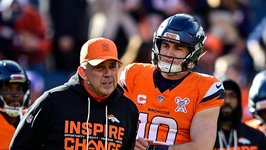 DENVER, CO - DECEMBER 21: Denver Broncos head coach Sean Payton and quarterback Bo Nix (10) have a word before a game between the Jacksonville Jaguars and the Denver Broncos at Empower Field at Mile High on December 21, 2025 in Denver, Colorado.