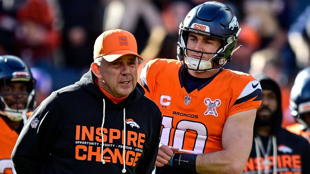 DENVER, CO - DECEMBER 21: Denver Broncos head coach Sean Payton and quarterback Bo Nix (10) have a word before a game between the Jacksonville Jaguars and the Denver Broncos at Empower Field at Mile High on December 21, 2025 in Denver, Colorado.