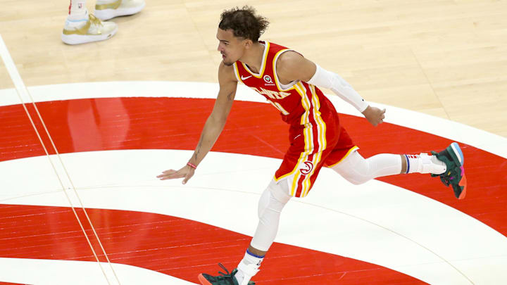 May 28, 2021; Atlanta, Georgia, USA; Atlanta Hawks guard Trae Young (11) celebrates a basket against the New York Knicks in the fourth quarter during game three in the first round of the 2021 NBA Playoffs at State Farm Arena. Mandatory Credit: Brett Davis-Imagn Images
