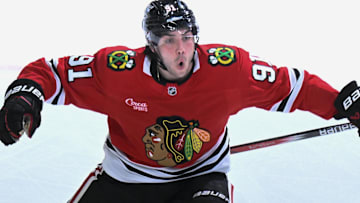 Apr 12, 2025; Chicago, Illinois, USA;  Chicago Blackhawks center Frank Nazar (91) celebrates after scoring a goal against the Winnipeg Jets during the third period at United Center. Mandatory Credit: Matt Marton-Imagn Images