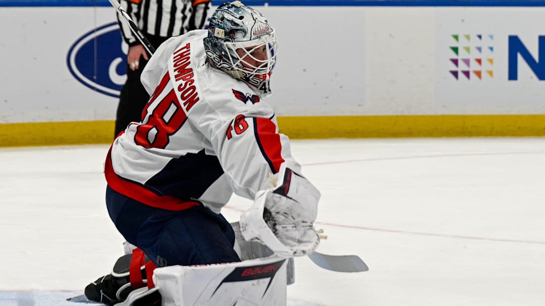 Nov 30, 2025; Elmont, New York, USA;  Washington Capitals goaltender Logan Thompson (48) makes a glove save against the New York Islanders during the second period at UBS Arena. Mandatory Credit: Dennis Schneidler-Imagn Images