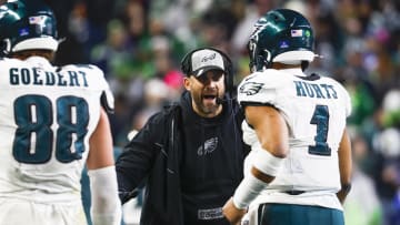 Dec 18, 2023; Seattle, Washington, USA; Philadelphia Eagles head coach Nick Sirianni greets quarterback Jalen Hurts (1) following a touchdown against the Seattle Seahawks during the third quarter at Lumen Field. Mandatory Credit: Joe Nicholson-USA TODAY Sports