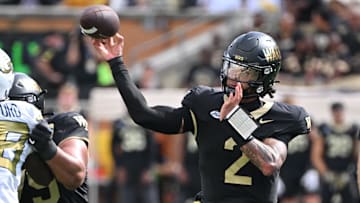 Sep 27, 2025; Winston-Salem, North Carolina, USA;  Wake Forest Demon Deacons quarterback Robby Ashford (2) throws the ball during the fourth quarter against the Georgia Tech Yellow Jackets at Allegacy Federal Credit Union Stadium. Yellow Jackets won 30-29. Mandatory Credit: Zachary Taft-Imagn Images
