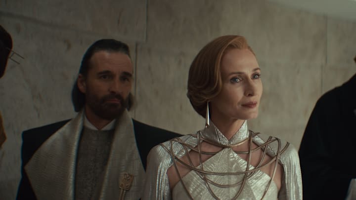 Star Wars (L-R) Perrin Fertha (Allistair Mackenzie), Mon Mothma (Genevieve O'Reilly) and Luthen Rael (Stellan Skarsgård) in Lucasfilm's ANDOR Season 2, exclusively on Disney+. Photo courtesy of Lucasfilm. ©2025 Lucasfilm Ltd. & TM. All Rights Reserved.
