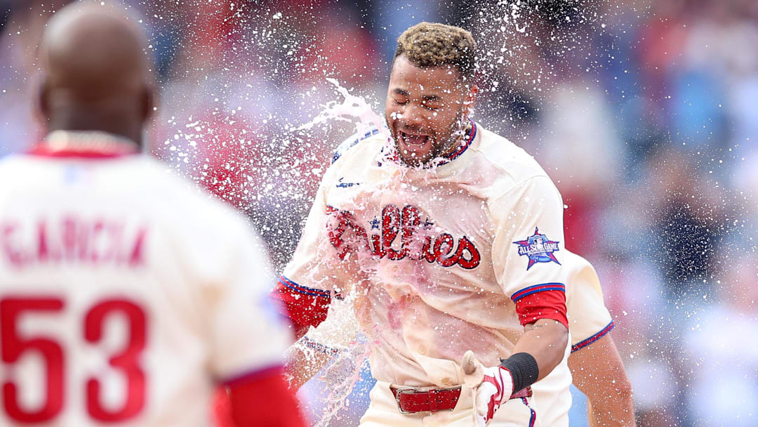 Apr 1, 2026; Philadelphia, Pennsylvania, USA; Philadelphia Phillies center fielder Justin Crawford (2) is doused with water after his walk off game winning RBI single during the tenth inning against the Washington Nationals at Citizens Bank Park. Mandatory Credit: Bill Streicher-Imagn Images
