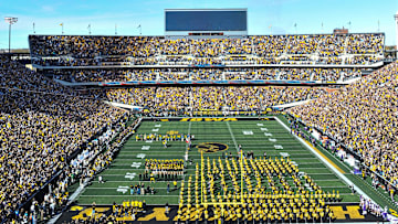 Oct 26, 2024; Iowa City, Iowa, USA; A military flyover takes place before a game between the Iowa Hawkeyes and the Northwestern Wildcats at Kinnick Stadium. Mandatory Credit: Jeffrey Becker-Imagn Images