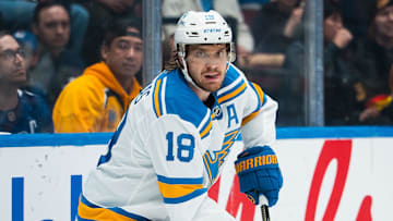 Oct 13, 2025; Vancouver, British Columbia, CAN; St. Louis Blues forward Robert Thomas (18) handles the puck against the Vancouver Canucks in the third period at Rogers Arena. Mandatory Credit: Bob Frid-Imagn Images