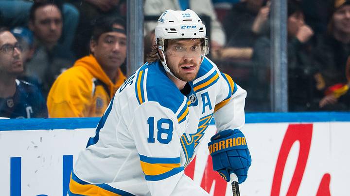 Oct 13, 2025; Vancouver, British Columbia, CAN; St. Louis Blues forward Robert Thomas (18) handles the puck against the Vancouver Canucks in the third period at Rogers Arena. Mandatory Credit: Bob Frid-Imagn Images
