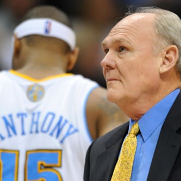 Nov 20, 2010; Denver, CO, USA; Denver Nuggets head coach George Karl walks onto the court during a time out in the second quarter called by the New Jersey Nets at the Pepsi Center. 