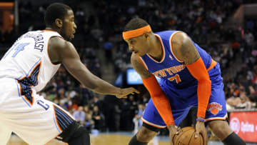 Nov 8, 2013; Charlotte, NC, USA; New York Knicks forward Carmelo Anthony (7) looks to drive past Charlotte Bobcats forward Michael Kidd-Gilchrist (14) during the game at Time Warner Cable Arena. Mandatory Credit: Sam Sharpe-USA TODAY Sports