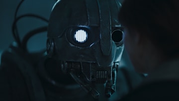 Fern (Ryan Kiera-Armstrong), SM-33 (Nick Frost) in Lucasfilm’s STAR WARS: SKELETON CREW, exclusively on Disney+. Photo courtesy of Lucasfilm. ©2024 Lucasfilm Ltd. & TM. All Rights Reserved.