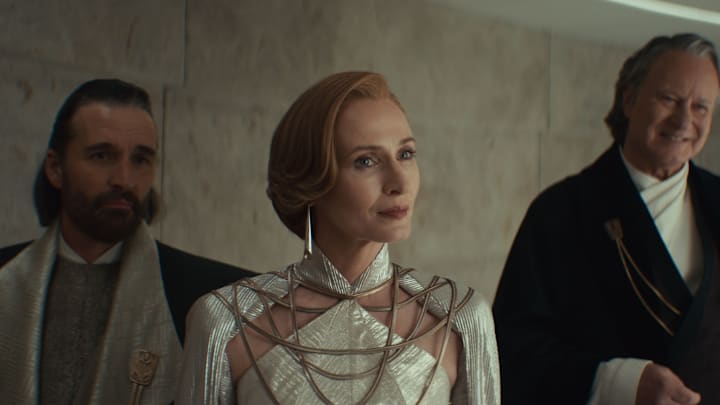 Star Wars (L-R) Perrin Fertha (Allistair Mackenzie), Mon Mothma (Genevieve O'Reilly) and Luthen Rael (Stellan Skarsgård) in Lucasfilm's ANDOR Season 2, exclusively on Disney+. Photo courtesy of Lucasfilm. ©2025 Lucasfilm Ltd. & TM. All Rights Reserved.
