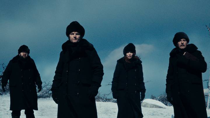 Zach Cherry, Adam Scott, Britt Lower and John Turturro in "Severance," now streaming on Apple TV+.
