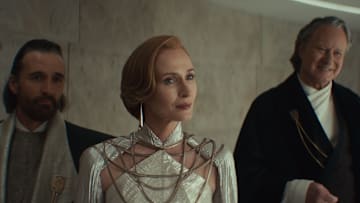 Star Wars (L-R) Perrin Fertha (Allistair Mackenzie), Mon Mothma (Genevieve O'Reilly) and Luthen Rael (Stellan Skarsgård) in Lucasfilm's ANDOR Season 2, exclusively on Disney+. Photo courtesy of Lucasfilm. ©2025 Lucasfilm Ltd. & TM. All Rights Reserved.