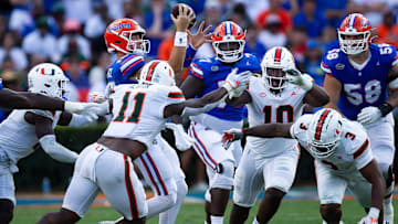 Florida Gators quarterback Graham Mertz (15) is sacked during the season opener at Ben Hill Griffin Stadium in Gainesville, FL on Saturday, August 31, 2024 against the University of Miami Hurricanes in the second half. Miami defeated the Gators 41-17. [Doug Engle/Gainesville Sun]