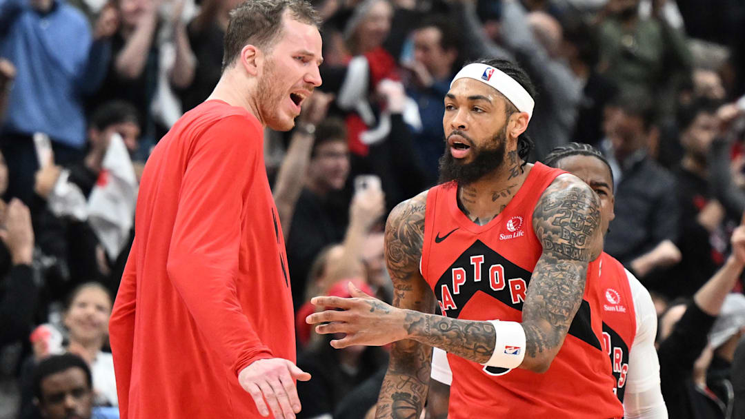 Apr 26, 2026; Toronto, Ontario, CAN;  Toronto Raptors forward Brandon Ingram (3) is greeted by center Jakob Poeltl (19) after sinking a three point basket at the end of the first half against the Cleveland Cavaliers during game four of the first round of the 2026 NBA Playoffs at Scotiabank Arena. Mandatory Credit: Dan Hamilton-Imagn Images