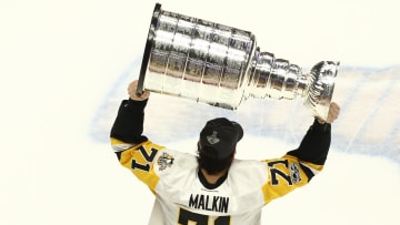 Pittsburgh Penguins center Evgeni Malkin (71) skates with the Stanley Cup after defeating the Nashville Predators in game six of the 2017 Stanley Cup Final