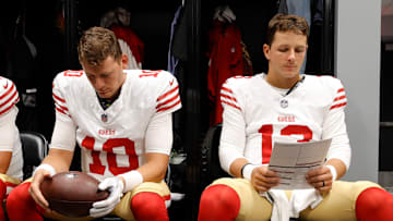 San Francisco 49ers quarterbacks Mac Jones (10) and Brock Purdy (13)
