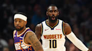 Nov 29, 2025; Phoenix, Arizona, USA; Denver Nuggets guard Tim Hardaway Jr. (10) celebrates a three point shot against Phoenix Suns guard Jordan Goodwin (23) in the first half at the Mortgage Matchup Center.