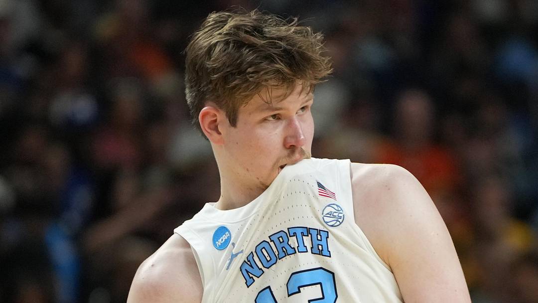 Mar 19, 2026; Greenville, SC, USA; North Carolina Tar Heels center Henri Veesaar (13) bites his jersey against the VCU Rams in the second half of a first round game of the men's 2026 NCAA Tournament at Bon Secours Wellness Arena. Mandatory Credit: Bob Donnan-Imagn Images