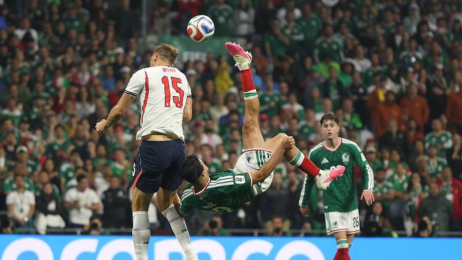 Dan Burn (left) blocking Raúl Jiménez’s overhead kick.