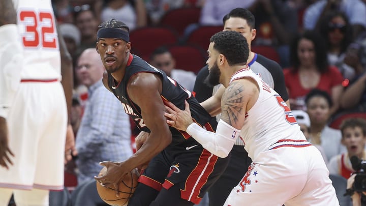 Apr 5, 2024; Houston, Texas, USA; Miami Heat forward Jimmy Butler (22) controls the. Ball as Houston Rockets guard Fred VanVleet (5) defends during the first quarter at Toyota Center. Mandatory Credit: Troy Taormina-USA TODAY Sports