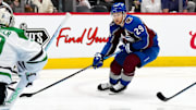 May 17, 2024; Denver, Colorado, USA; Colorado Avalanche center Nathan MacKinnon (29) skates towards Dallas Stars goaltender Jake Oettinger (29) in the second period in game six of the second round of the 2024 Stanley Cup Playoffs at Ball Arena. Mandatory Credit: Ron Chenoy-Imagn Images