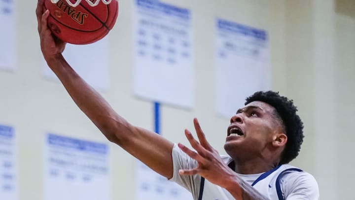 Nicolet's Davion Hannah (25) drives to the hoop against St. Thomas More during the Rick Majerus Wisconsin Basketball Yearbook Shootout at Concordia University in Mequon on Friday, Dec. 29, 2023.