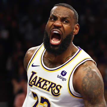 Feb 25, 2024; Phoenix, Arizona, USA; Los Angeles Lakers forward LeBron James (23) reacts as he celebrates a slam dunk against the Phoenix Suns at Footprint Center. Mandatory Credit: Mark J. Rebilas-Imagn Images