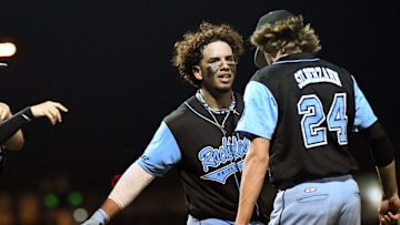 The Atlanta Braves signed catcher Jonathan Matos (facing camera) of Rockledge as an undrafted free agent.