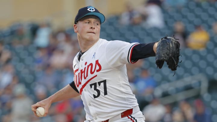 Minnesota Twins starting pitcher Louie Varland (37) throws to the Oakland Athletics in the fourth inning of game two of a double header at Target Field in Minneapolis on June 16, 2024.