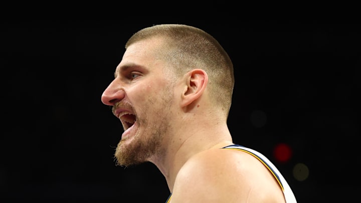 Denver Nuggets center Nikola Jokic (15) reacts against the Phoenix Suns at Mortgage Matchup Center on Mar 24, 2026.