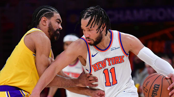 New York Knicks guard Jalen Brunson moves the ball against Los Angeles Lakers guard Gabe Vincent. New York Knicks guard Jalen Brunson moves the ball against Los Angeles Lakers guard Gabe Vincent.