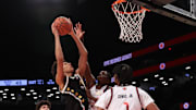 Apr 1, 2025; Brooklyn, NY, USA; McDonald's All American East forward Nate Ament (10) shoots the ball during the second half of the game at Barclays Center. Mandatory Credit: Pamela Smith-Imagn Images