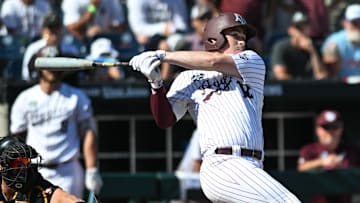 Jun 23, 2024; Omaha, NE, USA;  Texas A&M Aggies infielder Ryan Targac (12) flies out to end the game against the Tennessee Volunteers at Charles Schwab Field Omaha. Mandatory Credit: Steven Branscombe-Imagn Images