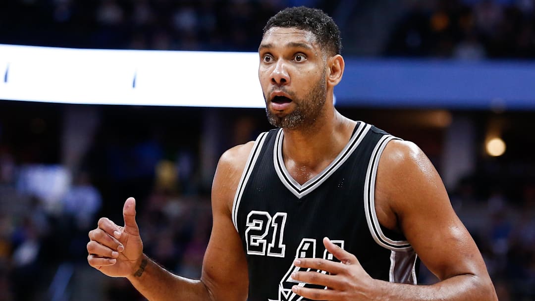 Apr 8, 2016; Denver, CO, USA; San Antonio Spurs center Tim Duncan (21) reacts after a call in the fourth quarter against the Denver Nuggets at the Pepsi Center. The Nuggets defeated the Spurs 102-98. Mandatory Credit: Isaiah J. Downing-Imagn Images