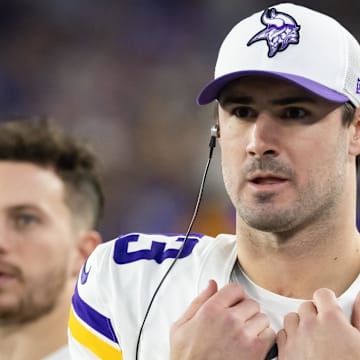 Jan 13, 2025; Glendale, AZ, USA; Minnesota Vikings quarterback Daniel Jones (13) against the Los Angeles Rams during an NFC wild card game at State Farm Stadium. Mandatory Credit: Mark J. Rebilas-Imagn Images