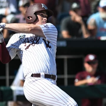 Jun 23, 2024; Omaha, NE, USA;  Texas A&M Aggies infielder Ryan Targac (12) flies out to end the game against the Tennessee Volunteers at Charles Schwab Field Omaha. Mandatory Credit: Steven Branscombe-USA TODAY Sports