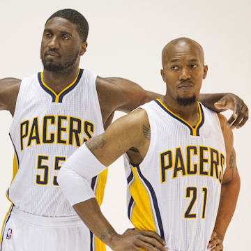 Sep 29, 2014; Indianapolis, IN, USA: Indiana Pacers forward Paul George (13), center Roy Hibbert (55) and forward David West (21) during media day at Bankers Life Fieldhouse. Mandatory Credit: Trevor Ruszkowski-Imagn Images
