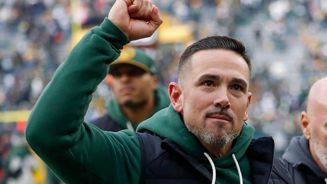 Green Bay Packers coach Matt LaFleur pumps his fist as he runs off the field after defeating the Minnesota Vikings on Nov. 23.