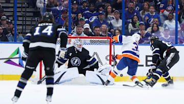 Feb 1, 2025; Tampa, Florida, USA; New York Islanders defenseman Adam Boqvist (34) scored a goal p[ast Tampa Bay Lightning goaltender Andrei Vasilevskiy (88) in the second period at Amalie Arena. Mandatory Credit: Nathan Ray Seebeck-Imagn Images