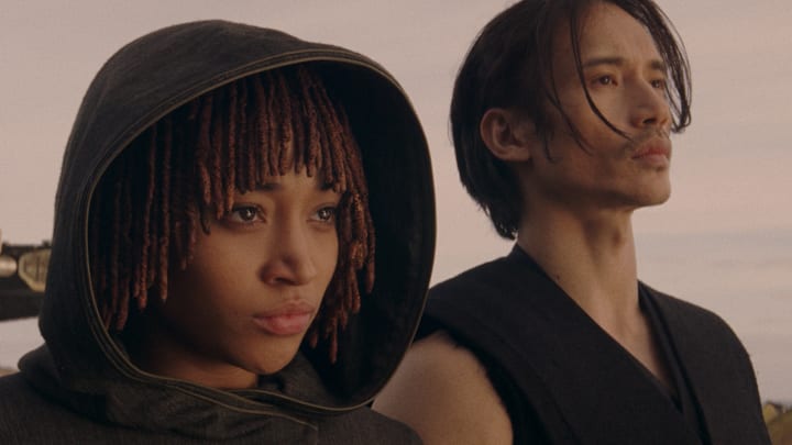 (L-R): Osha Aniseya (Amandla Stenberg) and the Stranger Qimir (Manny Jacinto) in Lucasfilm's Star Wars: THE ACOLYTE, season one, exclusively on Disney+. ©2024 Lucasfilm Ltd. & TM. All Rights Reserved.