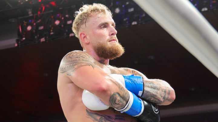 Dec 15, 2023; Orlando, Florida, USA;  Jake Paul reacts after knocking out Andre August in the first round at Caribe Royale Orlando. 