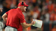 Oct 17, 2025; Miami Gardens, Florida, USA; Louisville Cardinals head coach Jeff Brohm reacts on the sideline against the Miami Hurricanes during the fourth quarter at Hard Rock Stadium. Mandatory Credit: Sam Navarro-Imagn Images