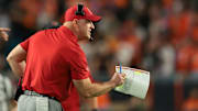 Oct 17, 2025; Miami Gardens, Florida, USA; Louisville Cardinals head coach Jeff Brohm reacts on the sideline against the Miami Hurricanes during the fourth quarter at Hard Rock Stadium. Mandatory Credit: Sam Navarro-Imagn Images
