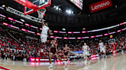 North Carolina State Wolfpack guard Paul McNeil (2) dunks on Boston College Eagles forward Chad Venning (32) during the first half of the game at Lenovo Center.